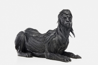 Illustration for article titled This Artist Turns Old Tires Into Dark, Disturbing Nightmare Monsters